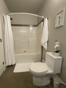 Bathroom with shower and tub, The Corner Suite