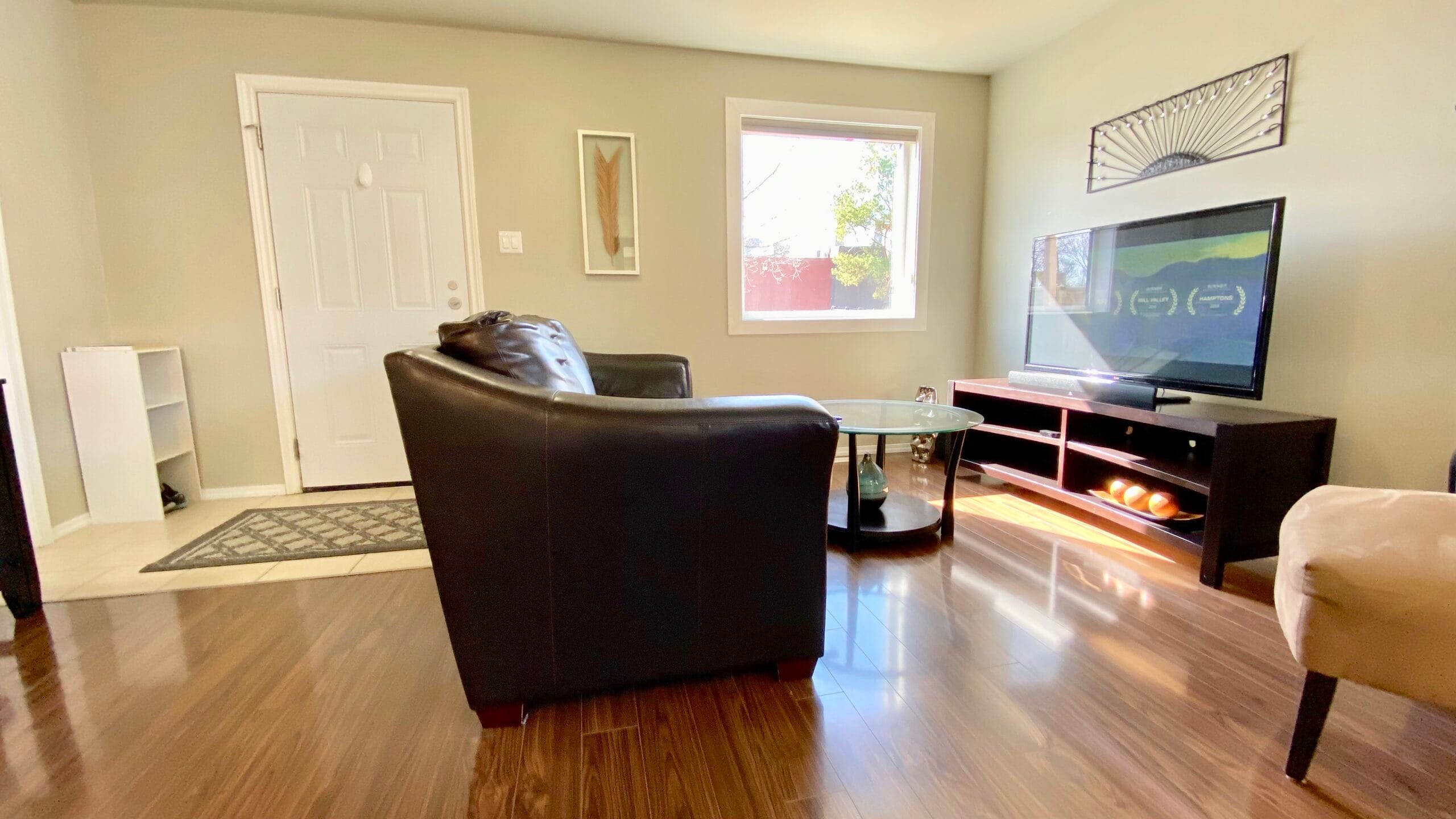 TV, entertainment unit, modern furniture in 1-bedroom fully furnished suite