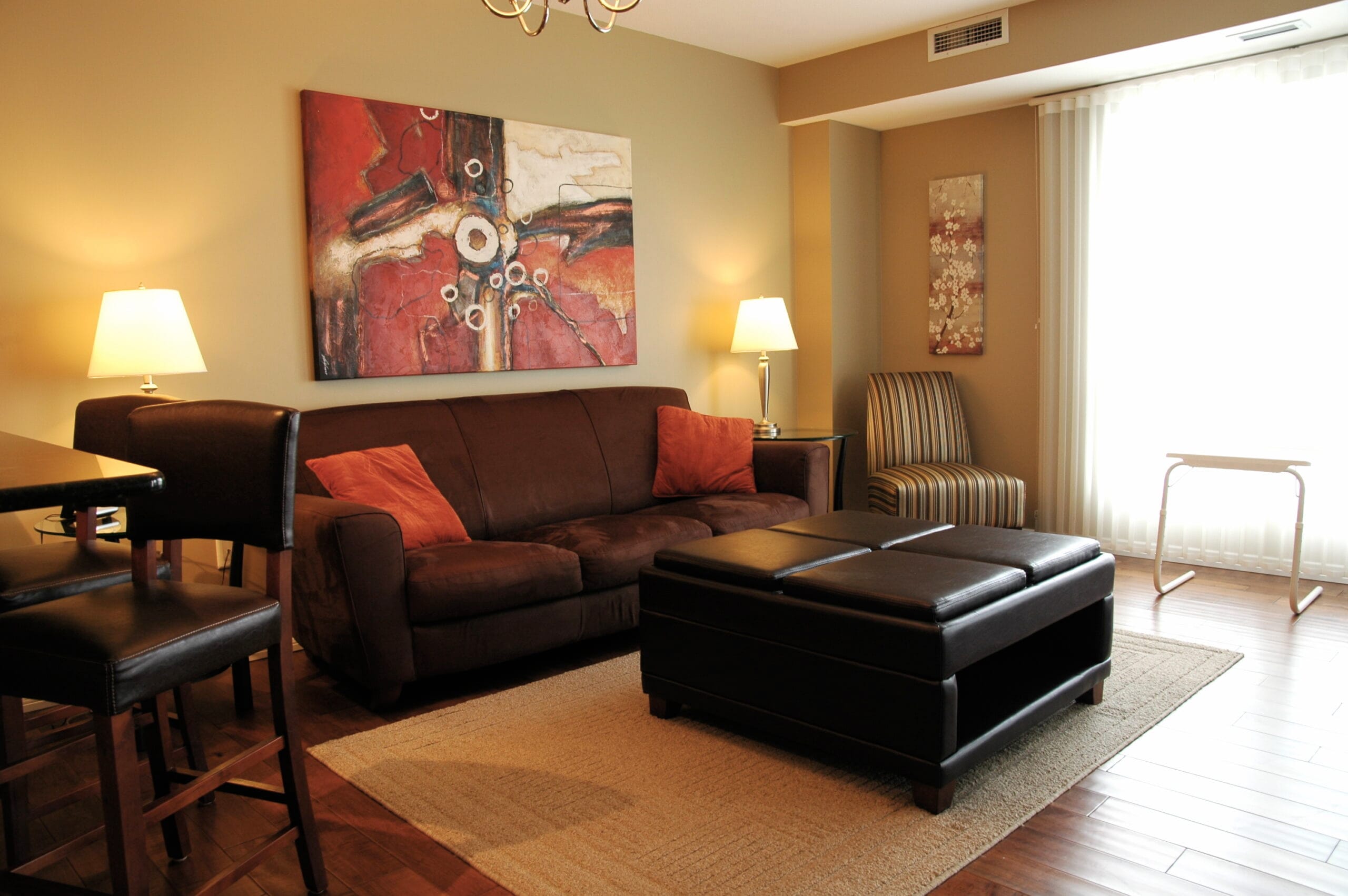 Living room at 1-bedroom furnished extended stay rental suite in Saskatoon, SK