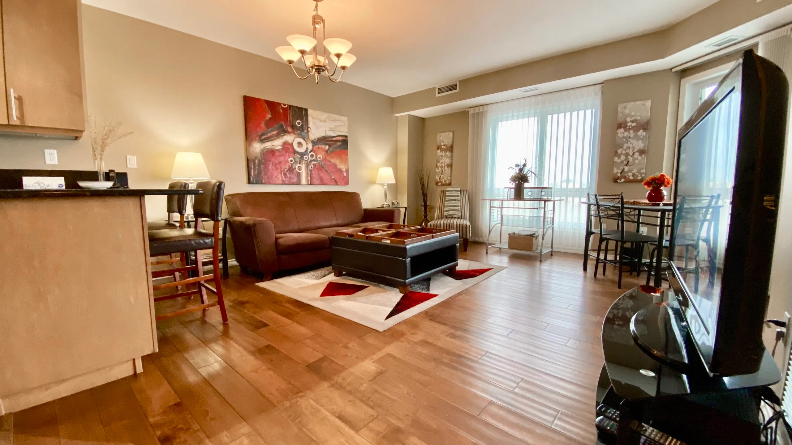 RF I Living room in 1-bedroom furnished extended stay rental suite in Saskatoon, SK