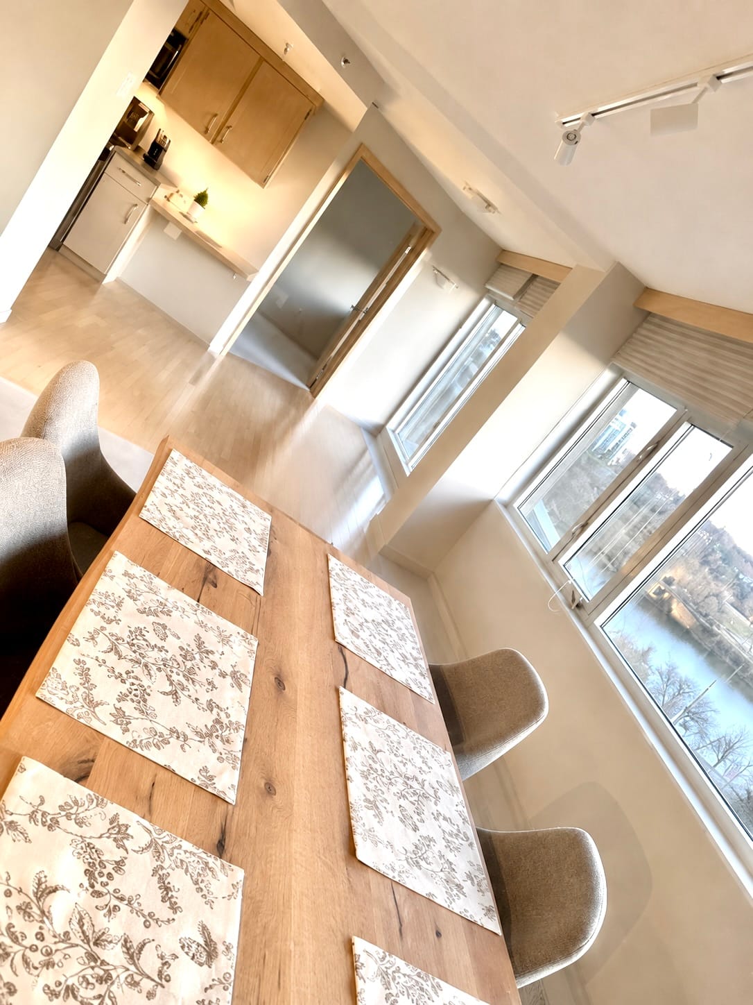 Dining for six in The Renaissance, a 1-Bedroom/1.5-Bathroom Furnished Rental for Extended Stays in Saskatoon.